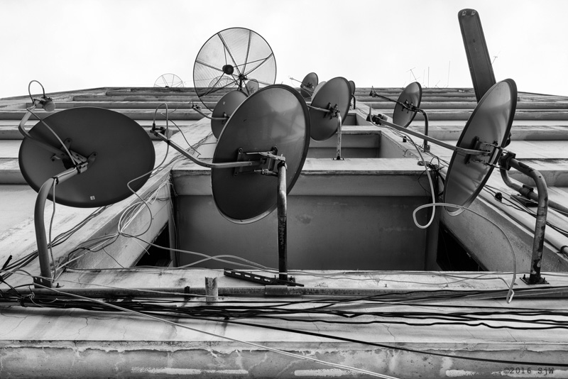 Satellite dishes on a wall in Bangkok