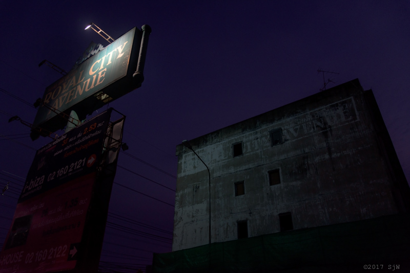 Royal City Avenue sign at dusk