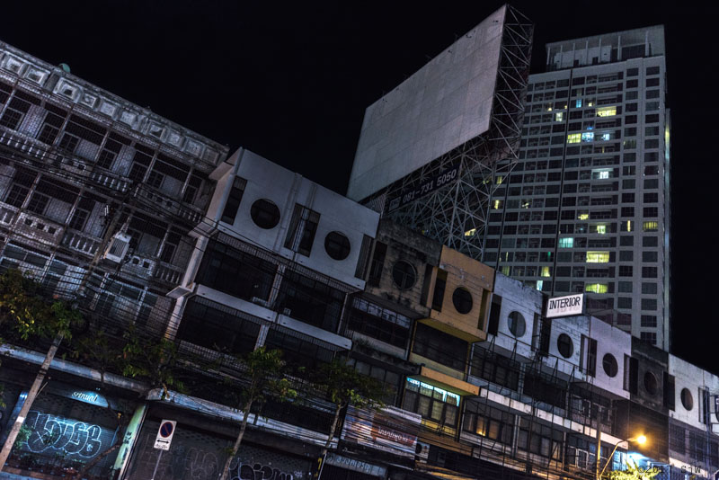 Buildings and billboard in Lat Phrao Rd. at night