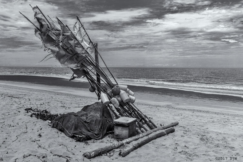 Fishermen's flags in the wind on the beach