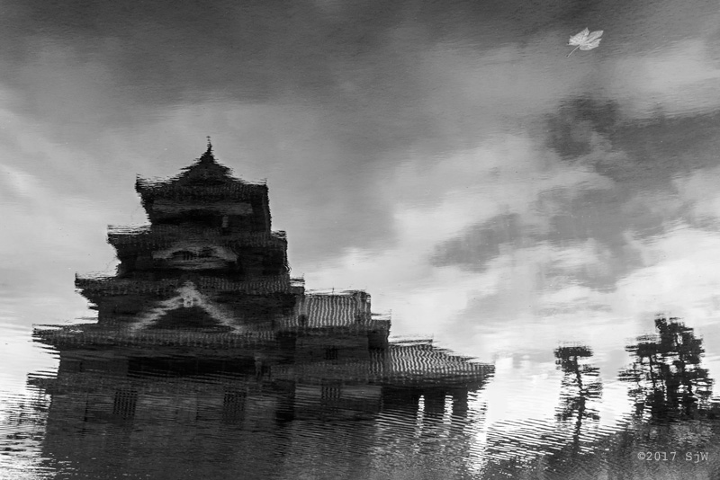 Matsumoto Castle reflected in the water of the moat